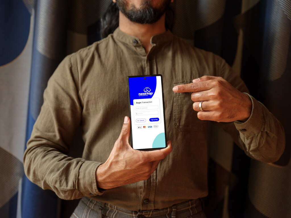 14-Nexxtap-man-in-khaki-shirt-holding-a-google-pixel-6-mockup
