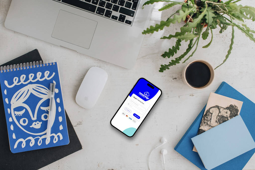 16-Nexxtap-mockup-of-smartphone-device-with-a-macbook-on-the-side